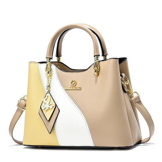 BOLSO DE MANO, CORREA AJUSTABLE CON DISEÑO DE BLOQUE DE COLORES