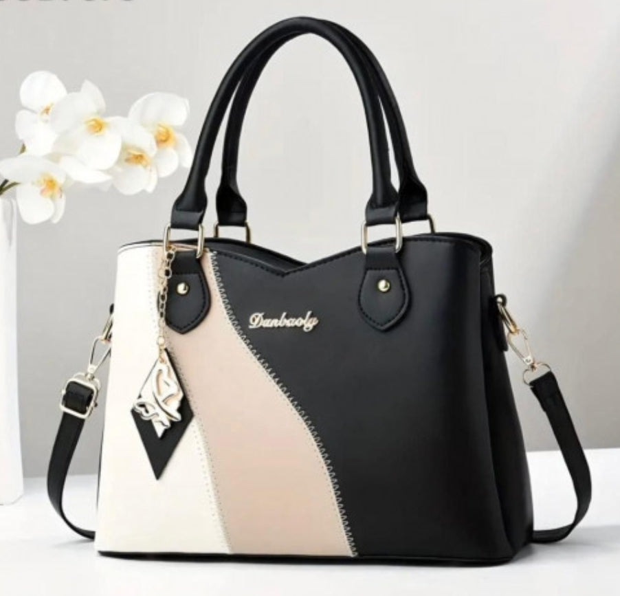 BOLSO DE MANO, CORREA AJUSTABLE CON DISEÑO DE BLOQUE DE COLORES