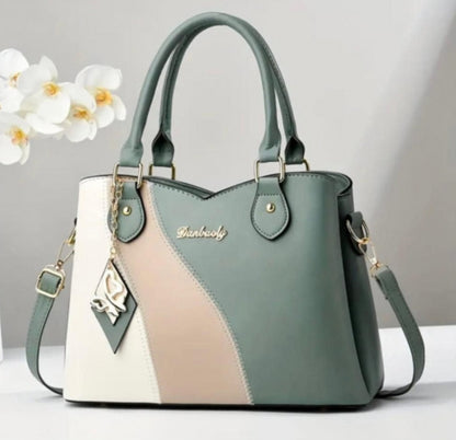 BOLSO DE MANO, CORREA AJUSTABLE CON DISEÑO DE BLOQUE DE COLORES