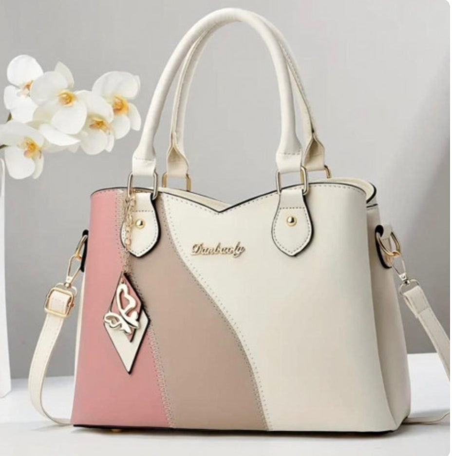 BOLSO DE MANO, CORREA AJUSTABLE CON DISEÑO DE BLOQUE DE COLORES