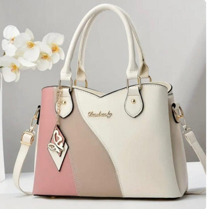 BOLSO DE MANO, CORREA AJUSTABLE CON DISEÑO DE BLOQUE DE COLORES