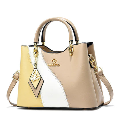 BOLSO DE MANO, CORREA AJUSTABLE CON DISEÑO DE BLOQUE DE COLORES