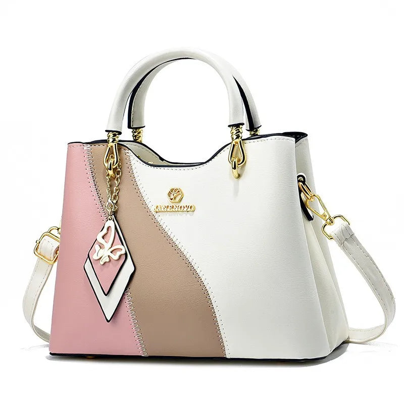 BOLSO DE MANO, CORREA AJUSTABLE CON DISEÑO DE BLOQUE DE COLORES