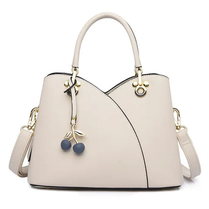 BOLSO  CON CORREA AJUSTABLE  DISEÑO COQUETO Y ELEGANTE