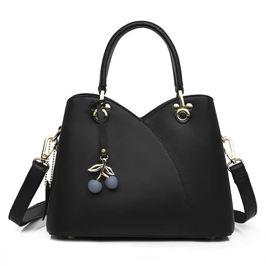 BOLSO  CON CORREA AJUSTABLE  DISEÑO COQUETO Y ELEGANTE