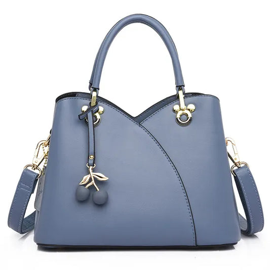 BOLSO  CON CORREA AJUSTABLE  DISEÑO COQUETO Y ELEGANTE