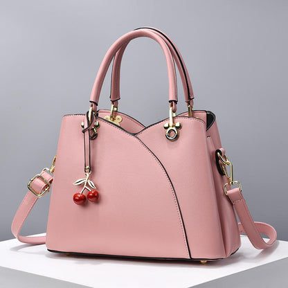 BOLSO  CON CORREA AJUSTABLE  DISEÑO COQUETO Y ELEGANTE
