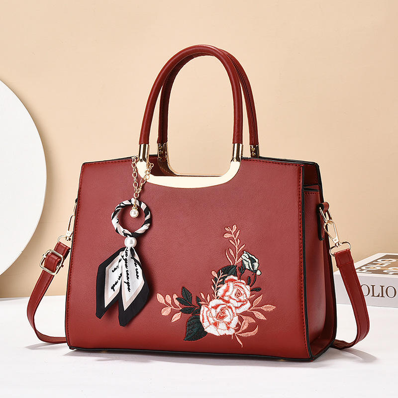 CARTE﻿RA DE DAMA HECHA EN CUERO SINTÉTICO CON CORREA DE HOMBRO DESMONTABLE