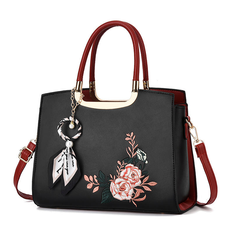 CARTE﻿RA DE DAMA HECHA EN CUERO SINTÉTICO CON CORREA DE HOMBRO DESMONTABLE